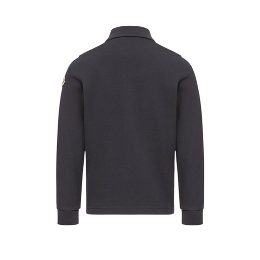 Polo blu con patch logo Moncler sulla manica